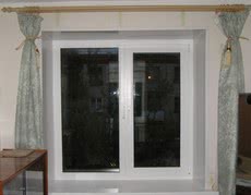 Двустворчатое пластиковое окно немецкого качества (Арциз) Rehau Euro 60